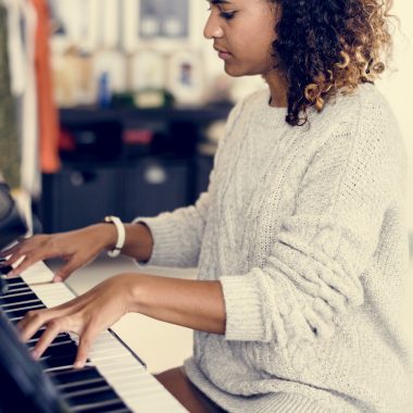 Woman playing on a piano